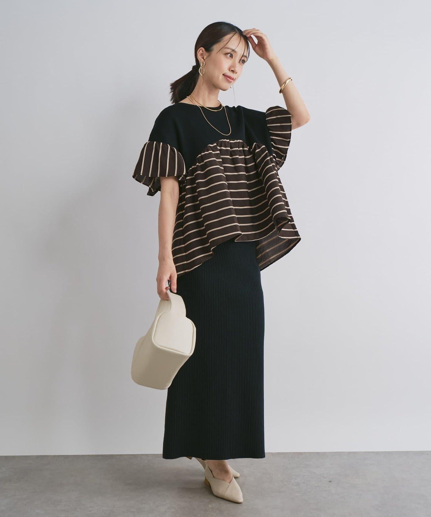 一件穿出時尚感針織拼接提花條紋