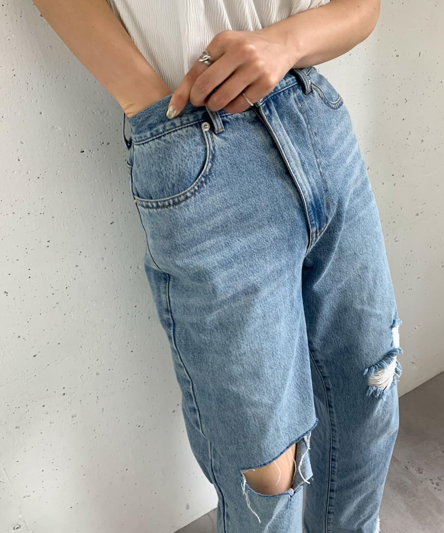 改良破洞開叉牛仔褲