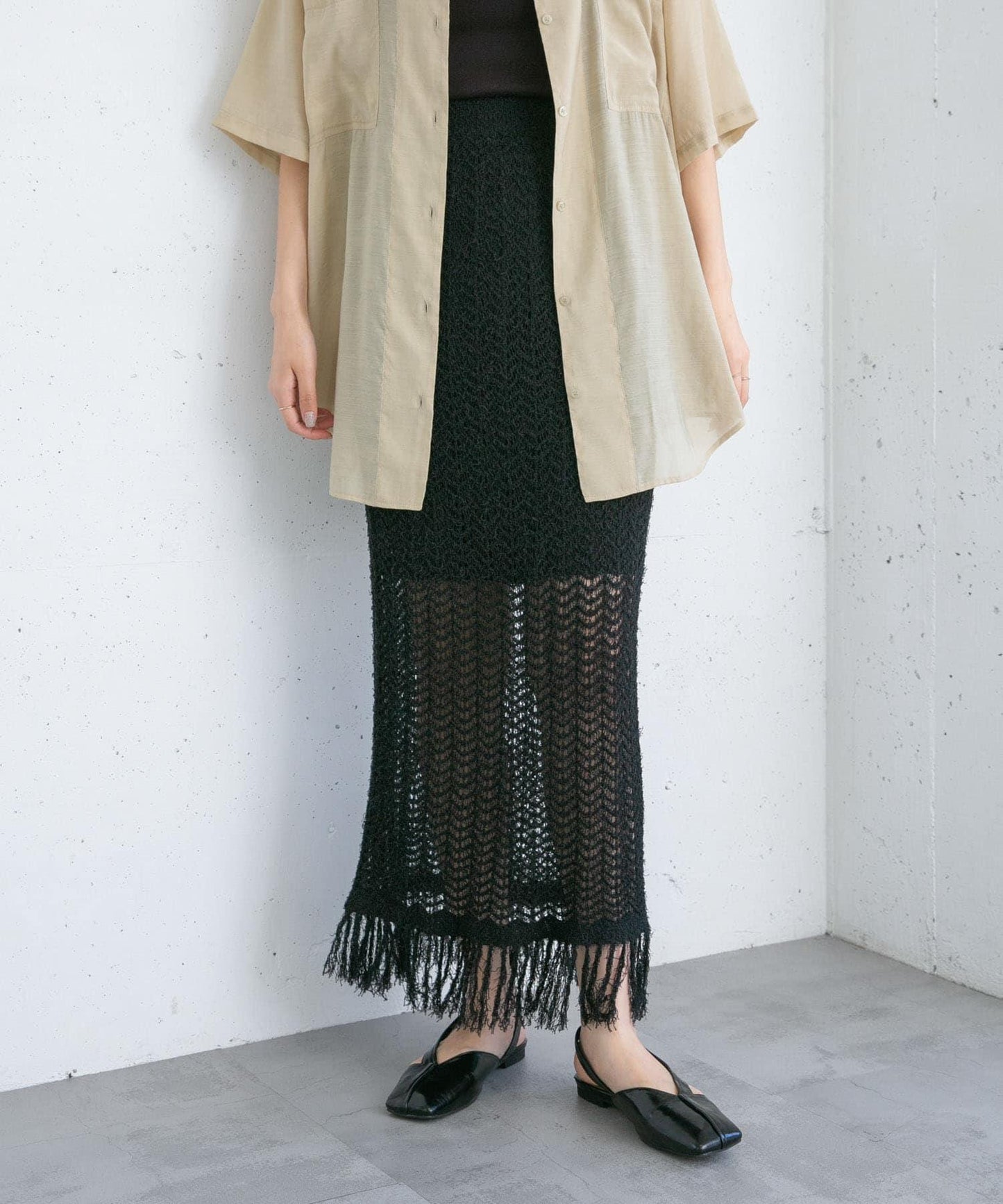 流蘇鏤空針織半身裙