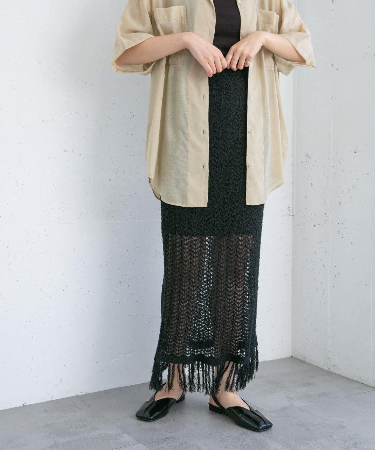 流蘇鏤空針織半身裙