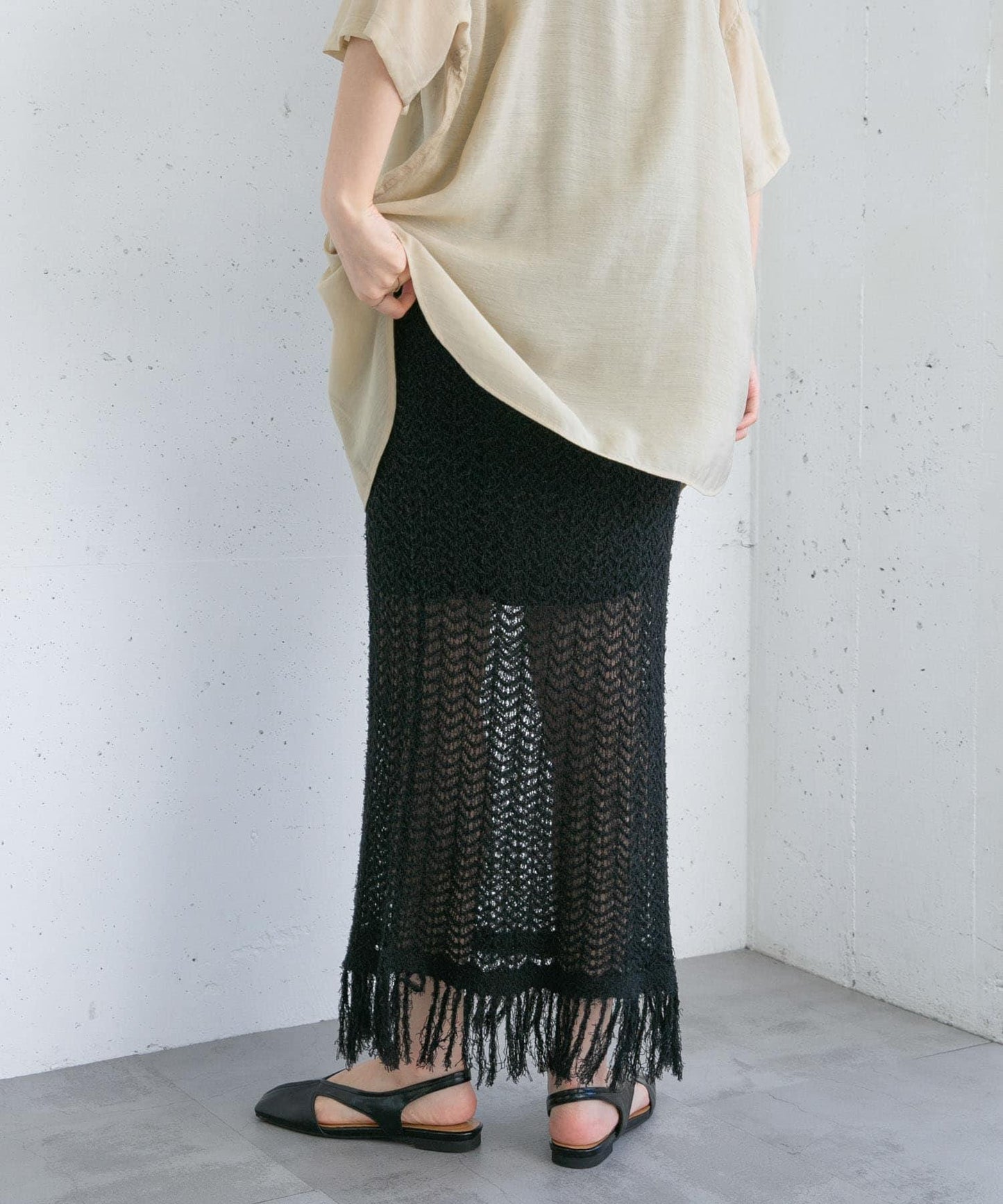 流蘇鏤空針織半身裙