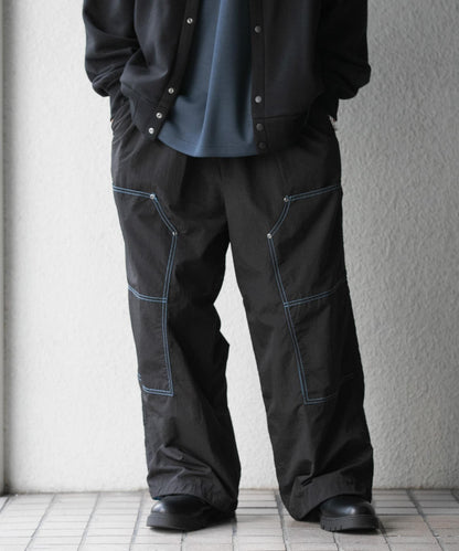 雙色拼接雙膝長褲