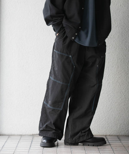 雙色拼接雙膝長褲