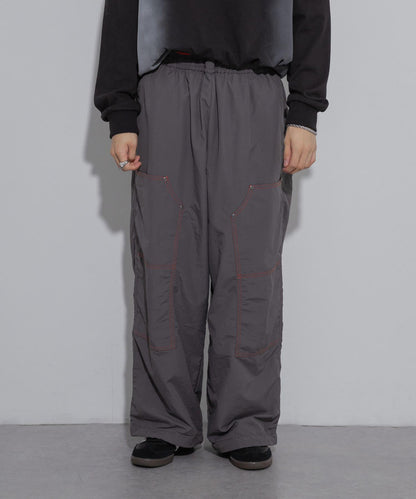 雙色拼接雙膝長褲