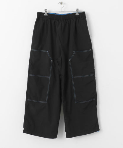 雙色拼接雙膝長褲