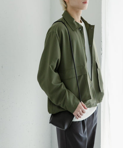 可搭配套裝雙口袋抽繩短夾克