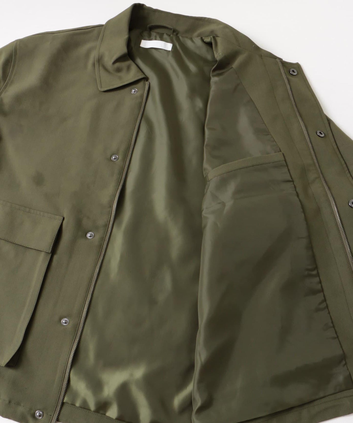 可搭配套裝雙口袋抽繩短夾克