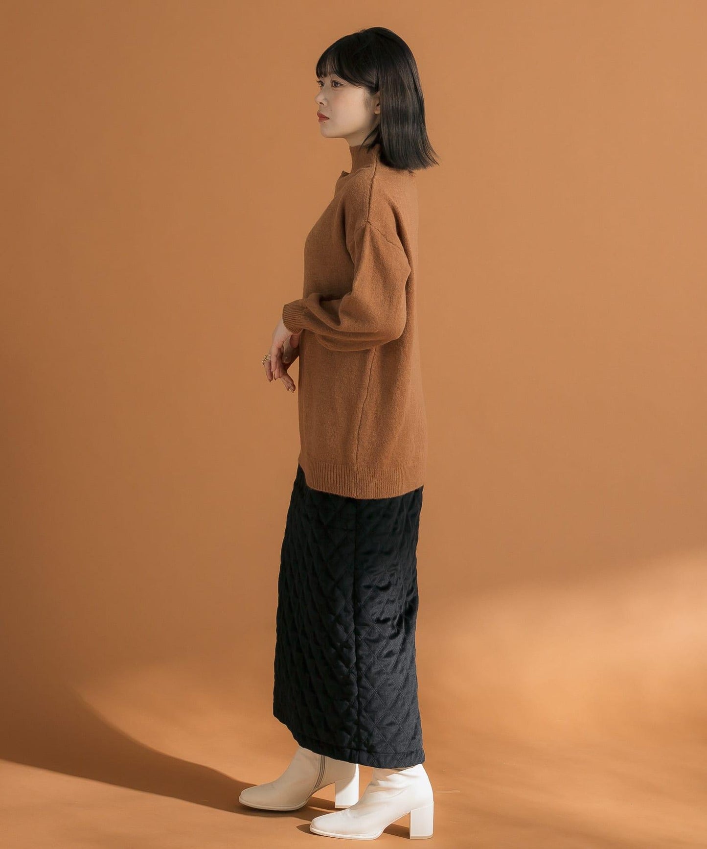 不對稱一字肩寬鬆針織衫