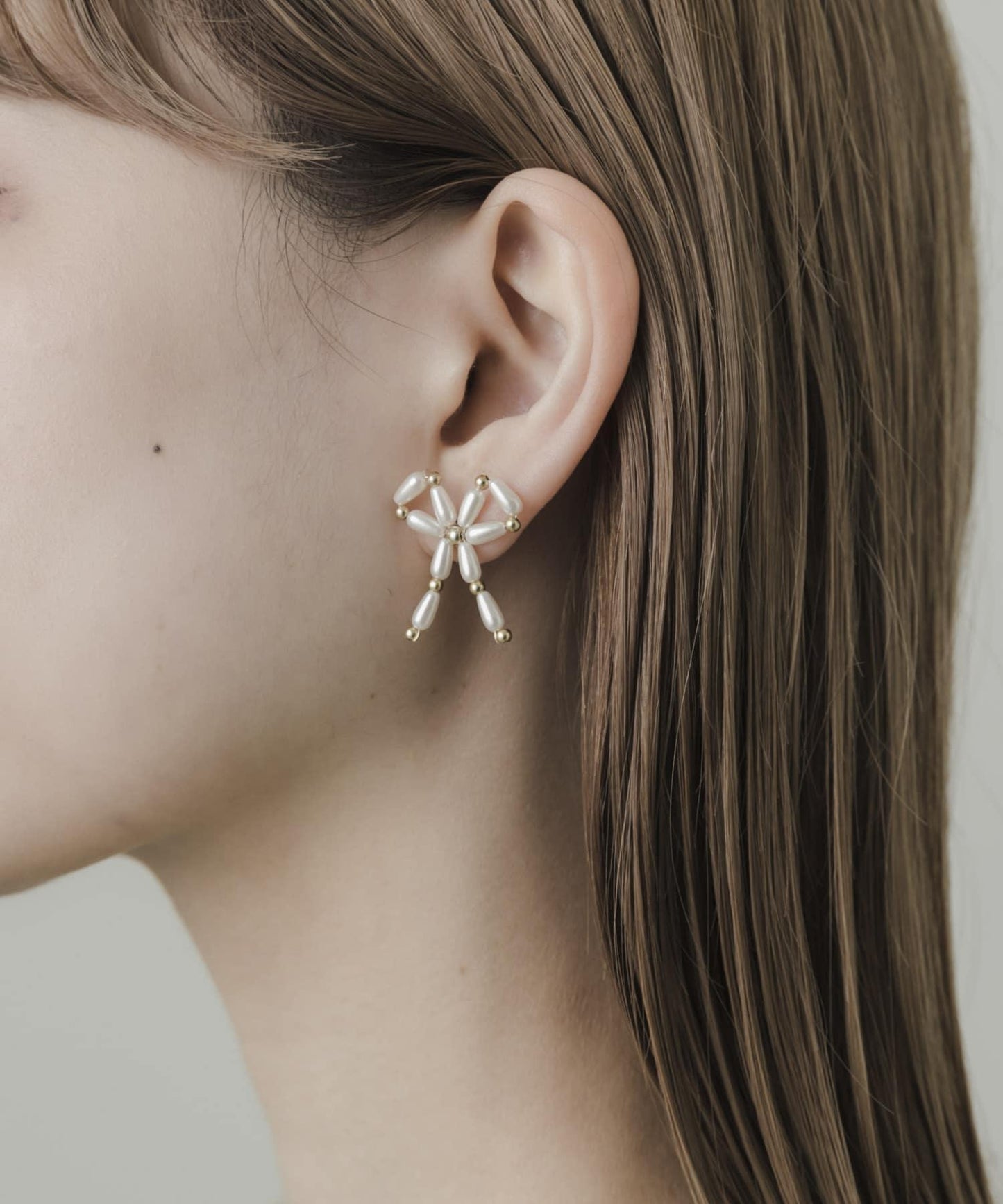 珍珠金屬蝴蝶結耳環