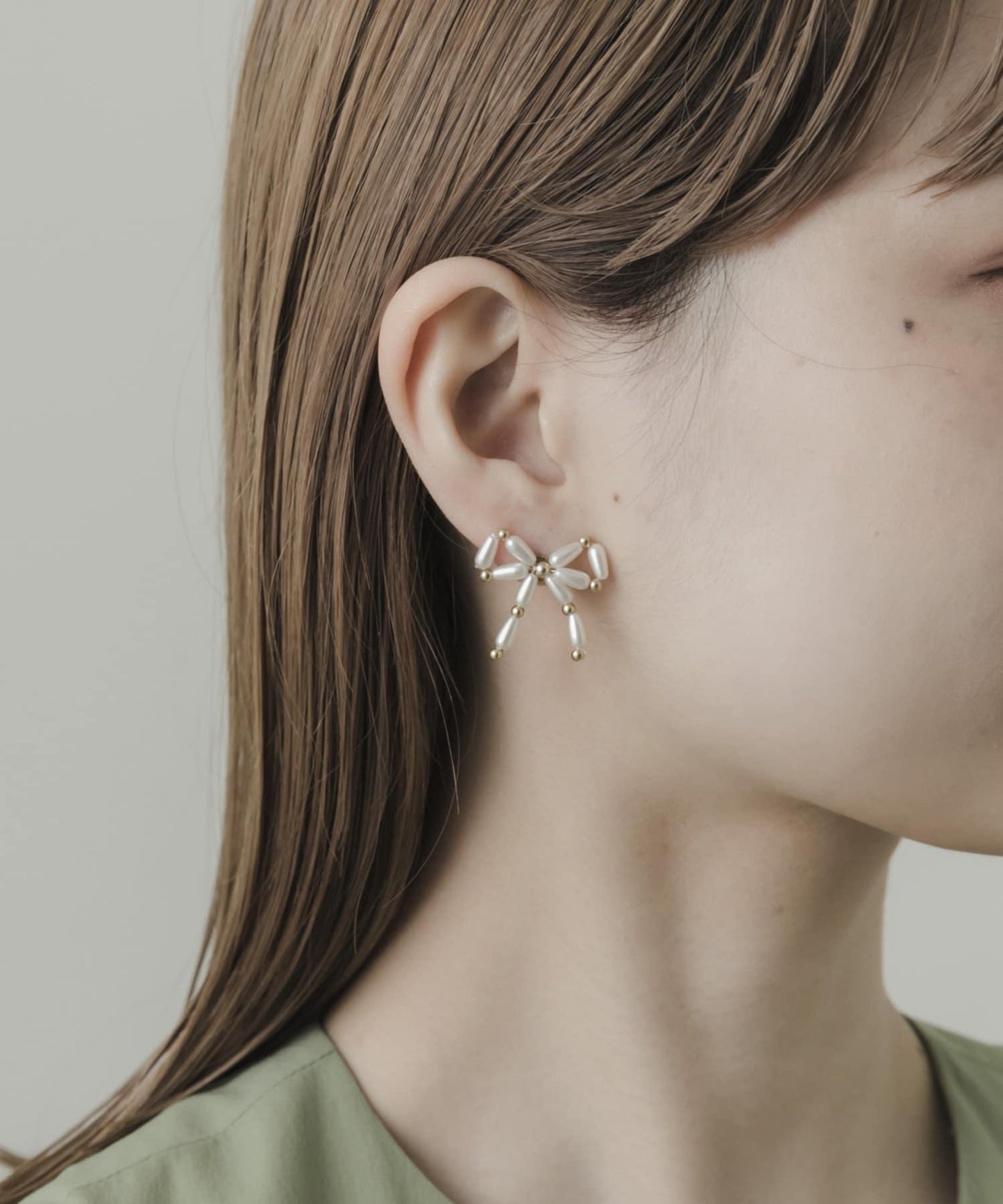 珍珠金屬蝴蝶結耳環