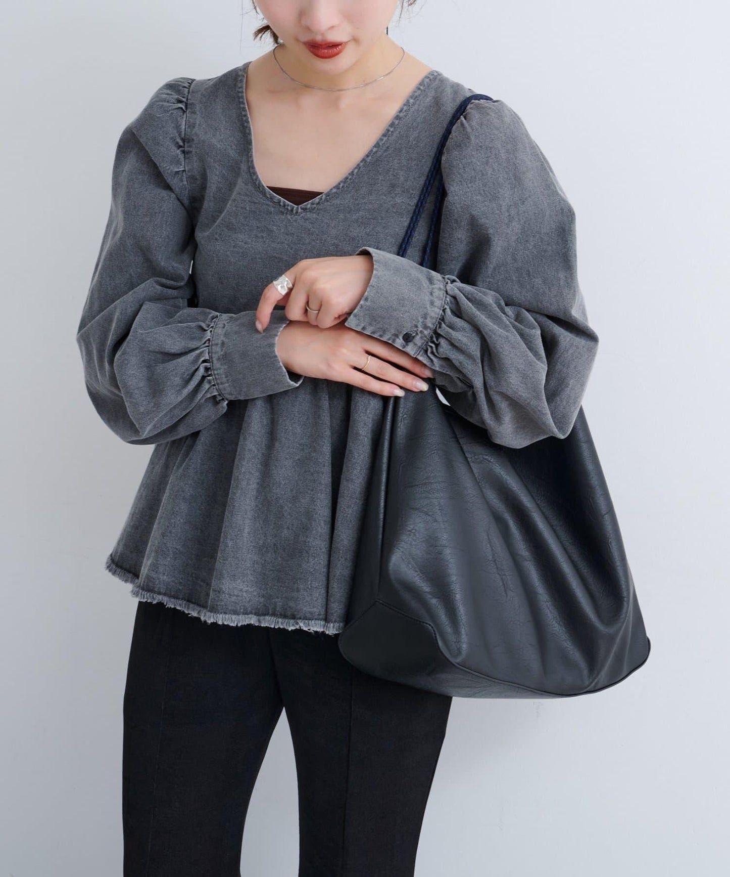 B 不對稱皮革包