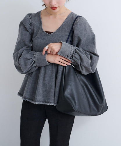 B 不對稱皮革包