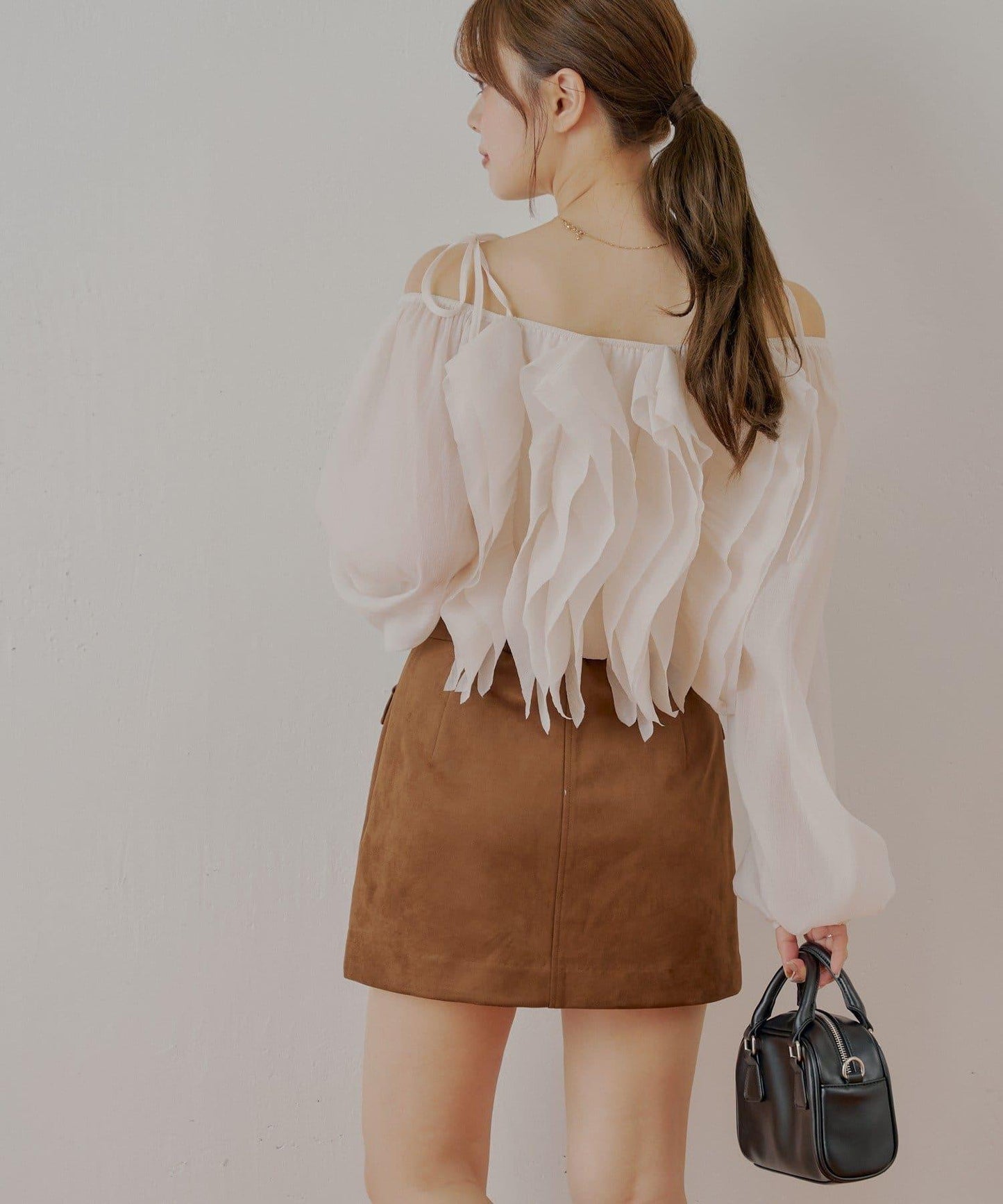 【Chico】前扣麂皮絨A字裙