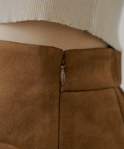 【Chico】前扣麂皮絨A字裙