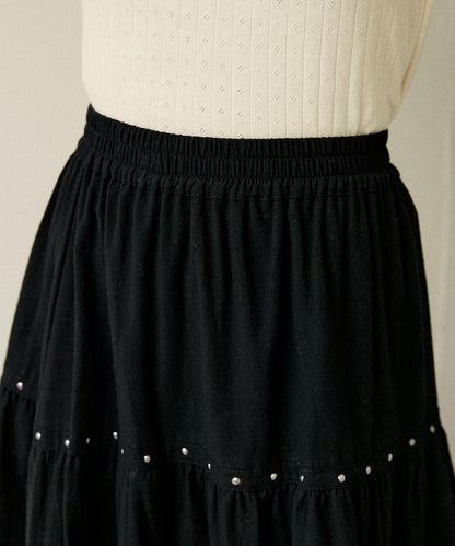 鉚釘裝飾不對稱層疊半身裙