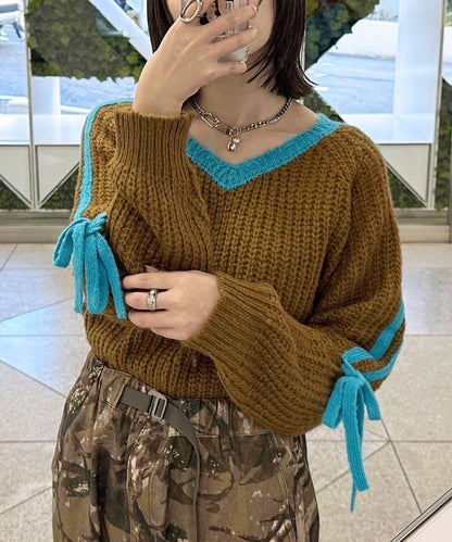 袖部條紋蝴蝶結插肩袖針織衫