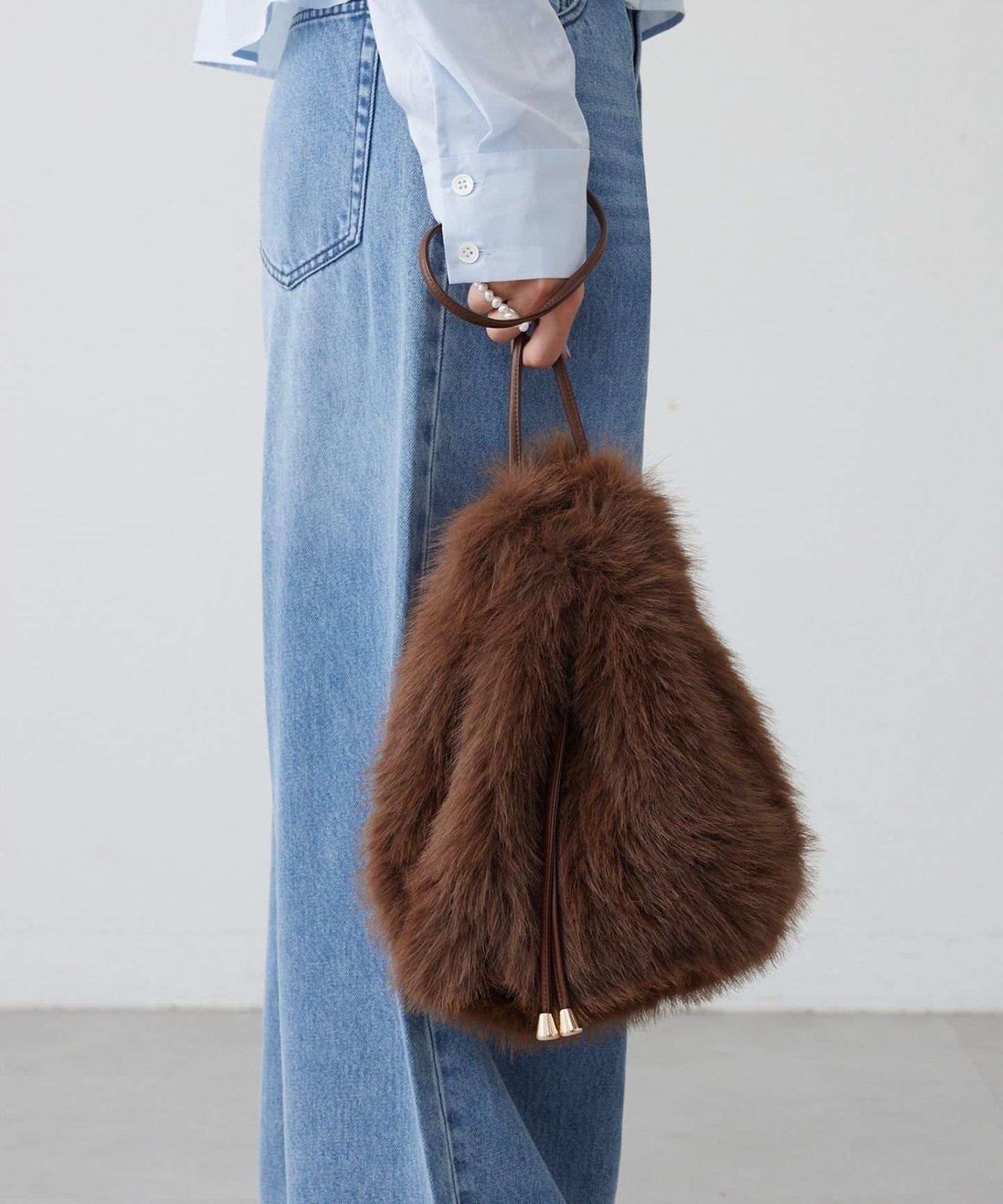 【THE PAUSE】仿皮草抽繩揹包