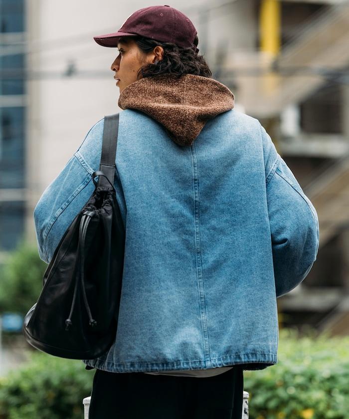 防潑水牛皮束口單肩包