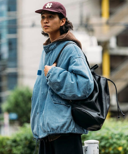 防潑水牛皮束口單肩包