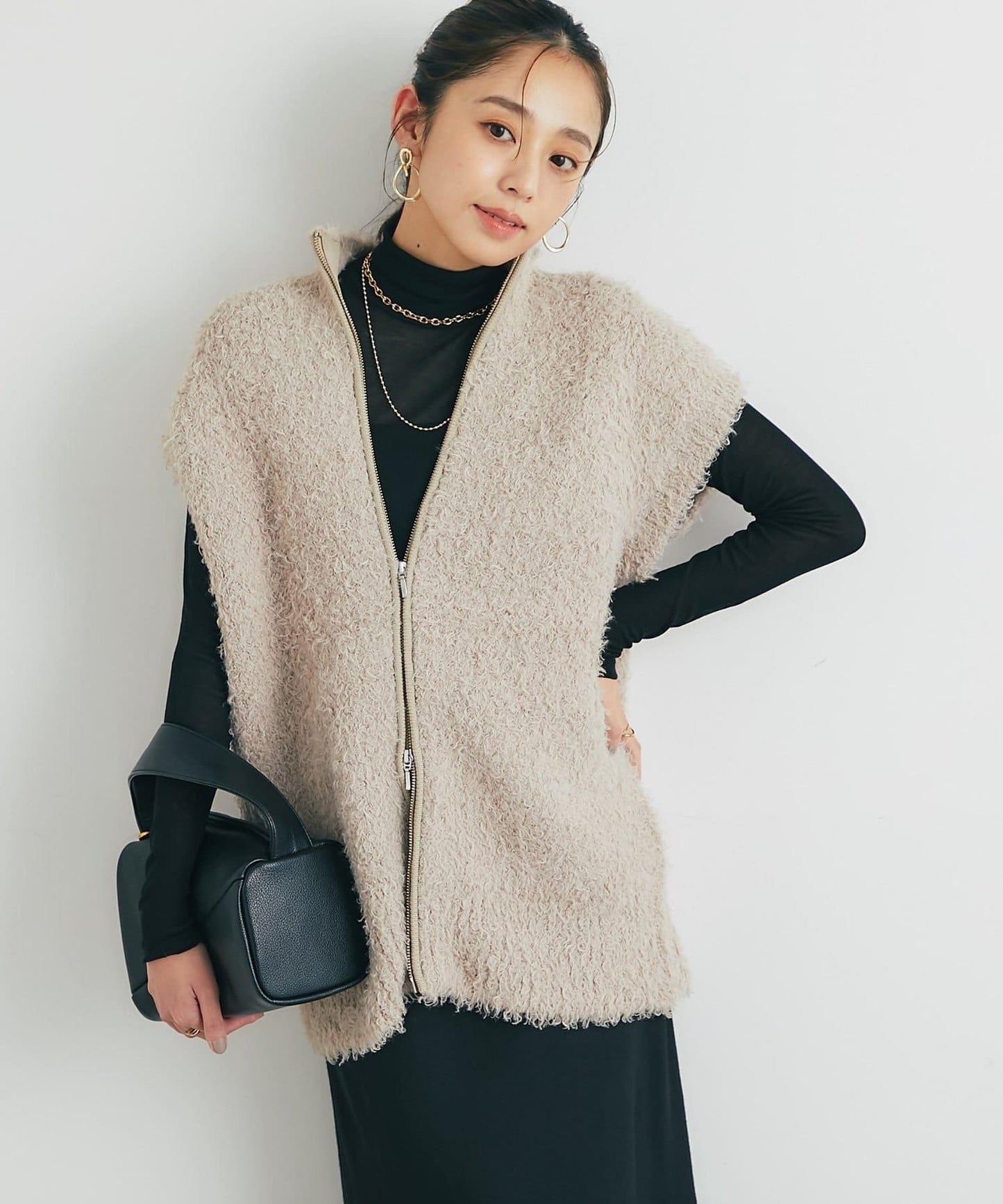 休閒風格仿羊羔絨針織拉鍊馬甲