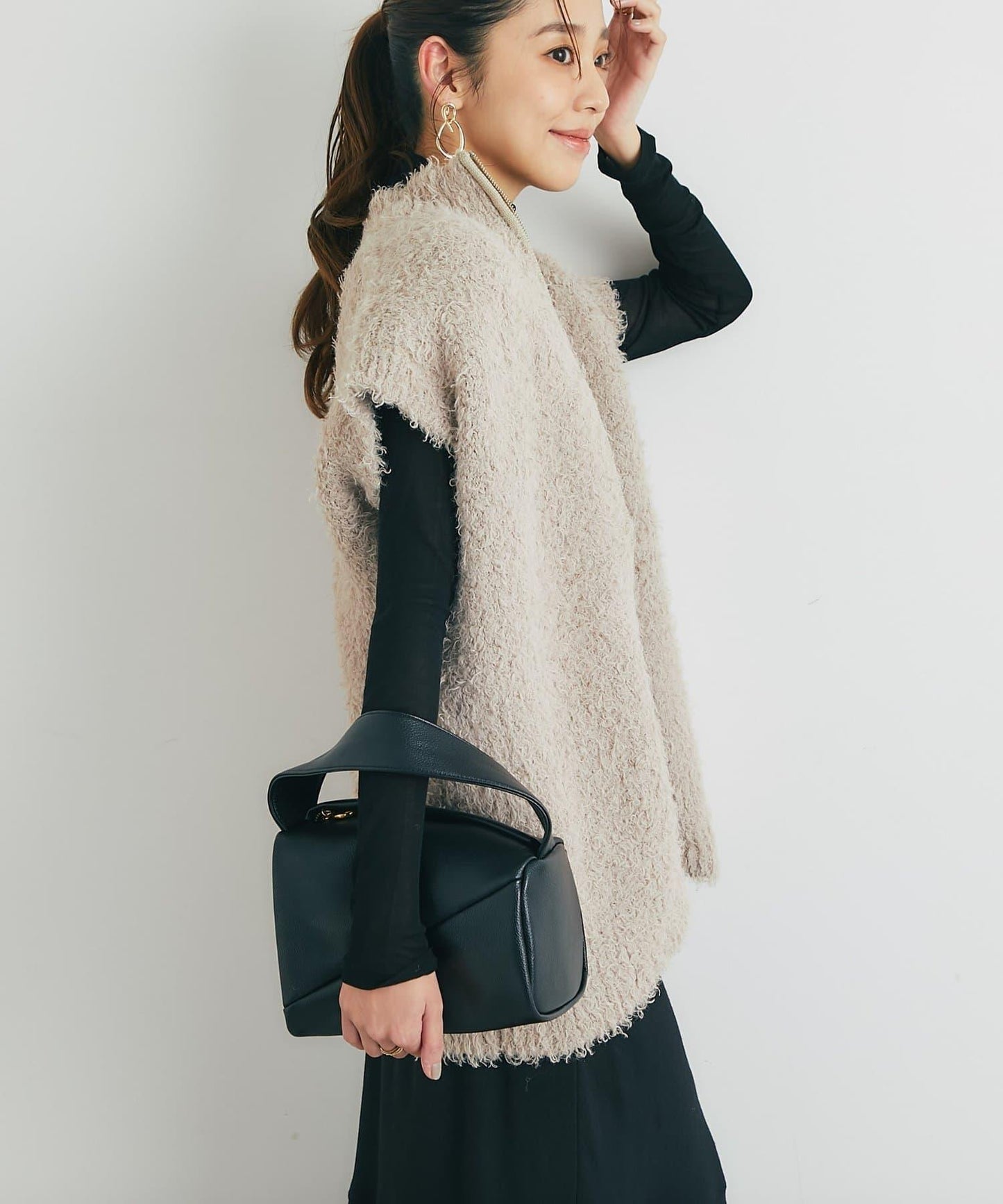 休閒風格仿羊羔絨針織拉鍊馬甲