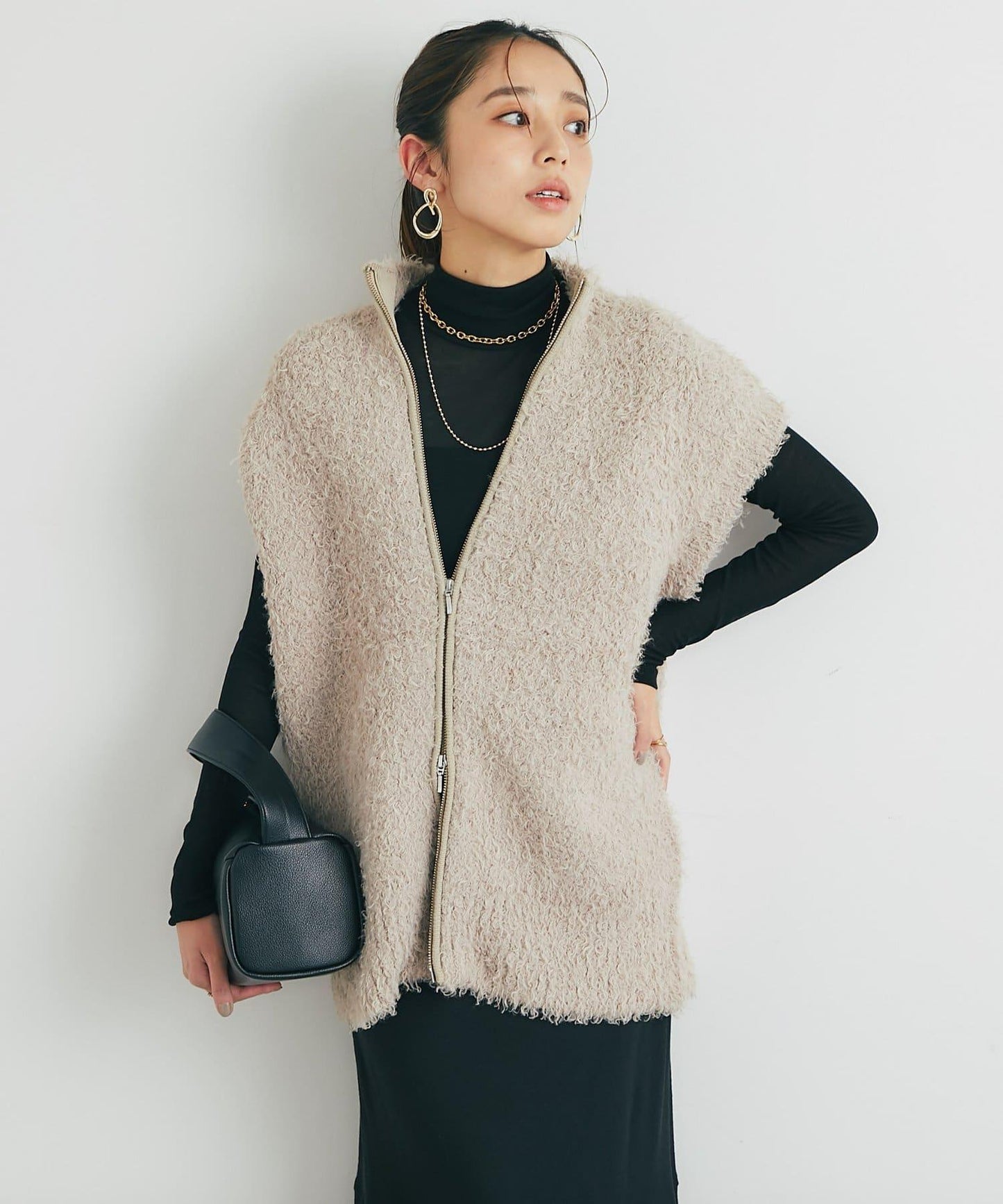 休閒風格仿羊羔絨針織拉鍊馬甲