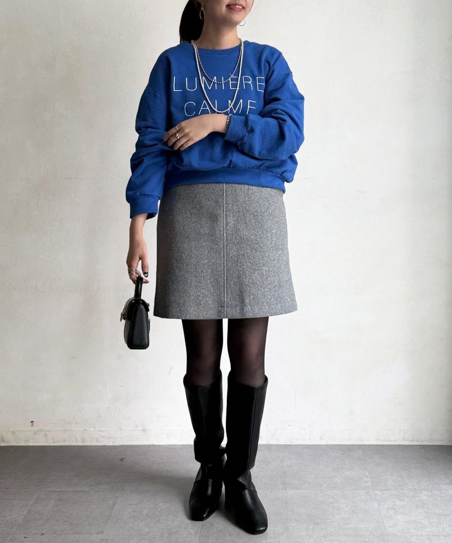 帶鉚釘呢料中長裙