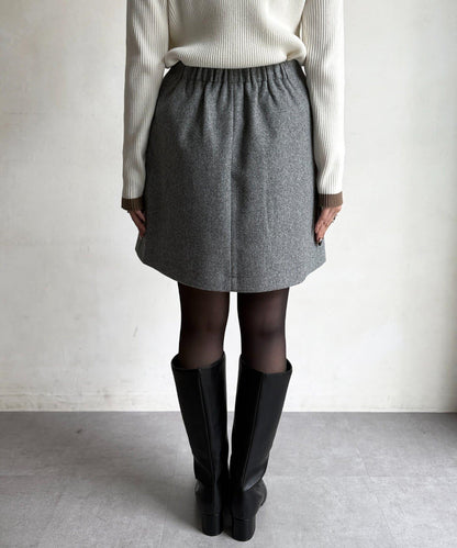 帶鉚釘呢料中長裙