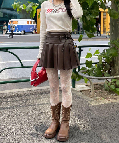 皮革百褶包裹式迷你裙