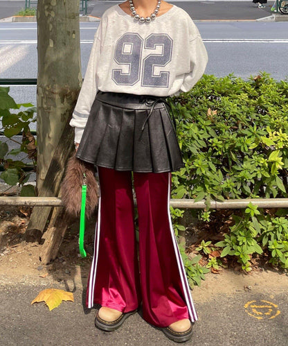 皮革百褶包裹式迷你裙