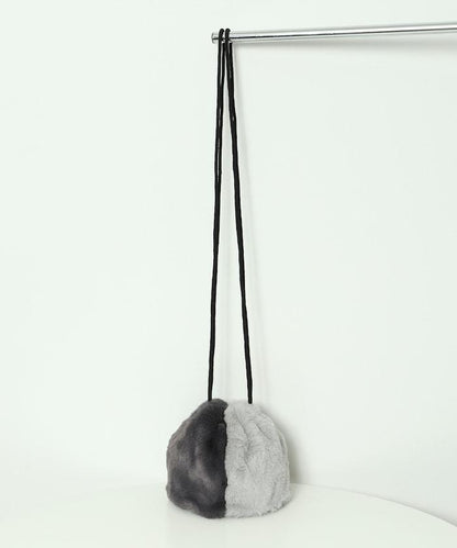 仿皮草迷你束口包