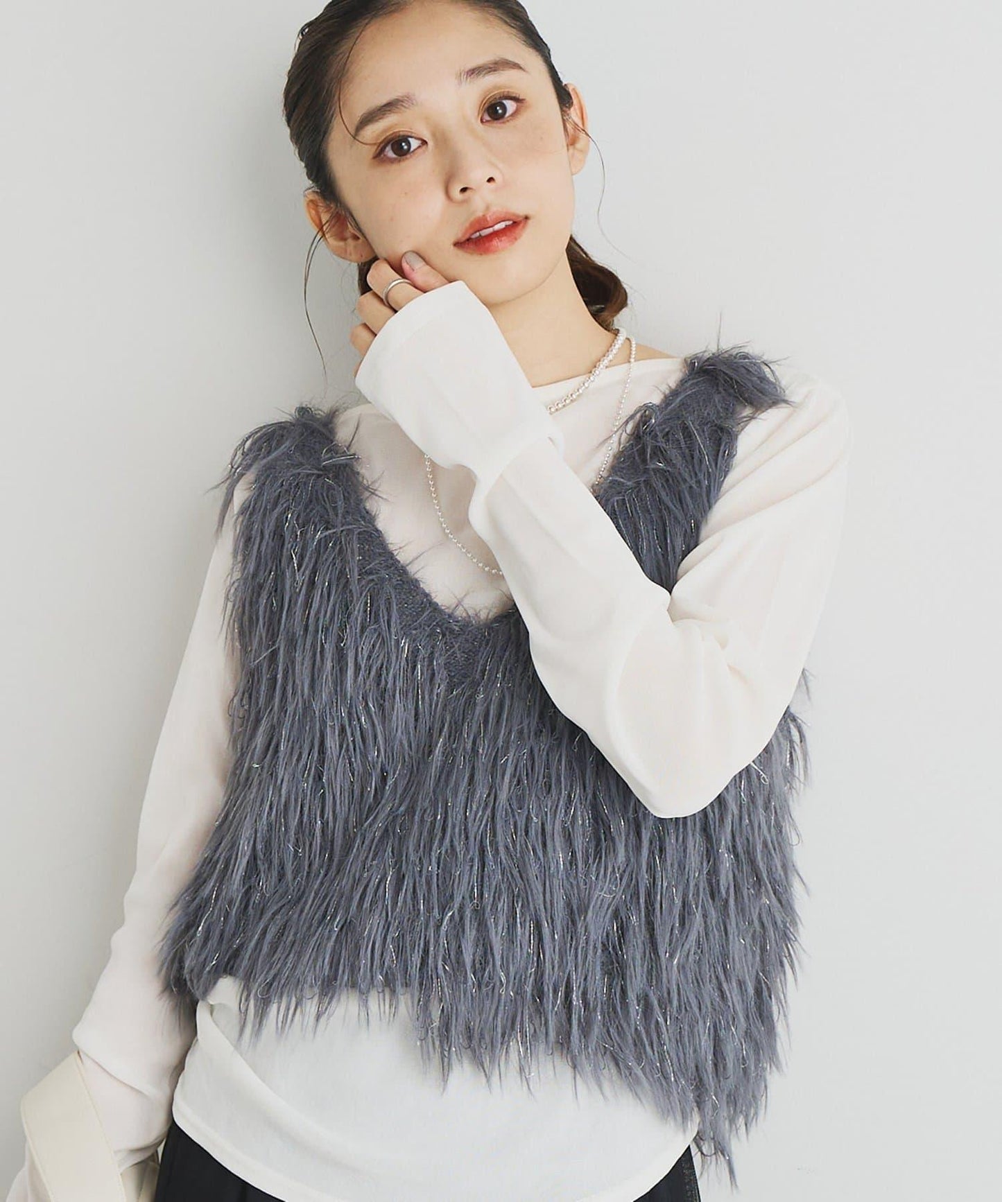 大人女性感羽毛針織背心