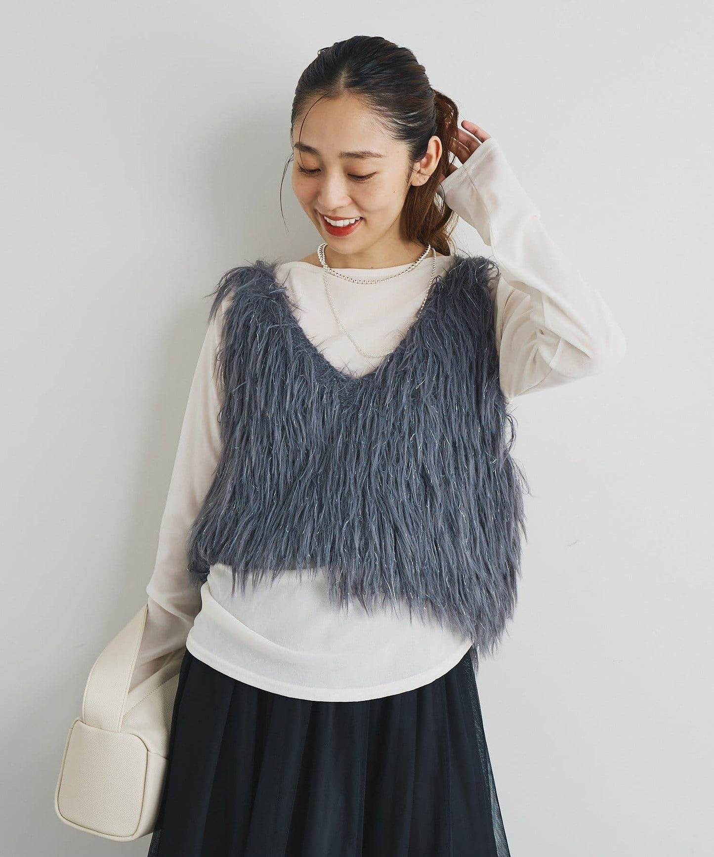 大人女性感羽毛針織背心