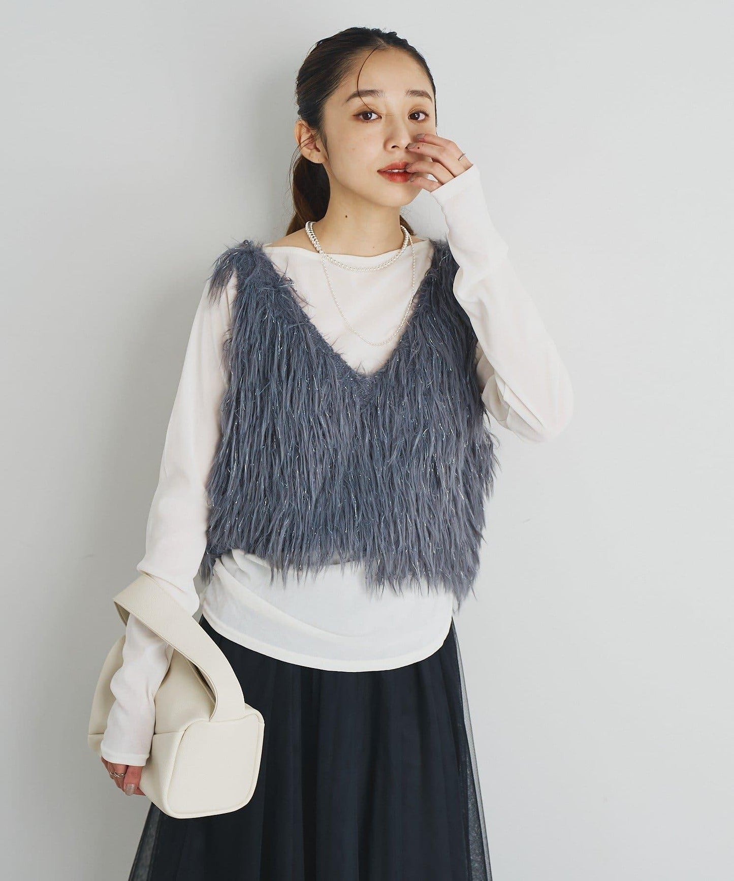 大人女性感羽毛針織背心