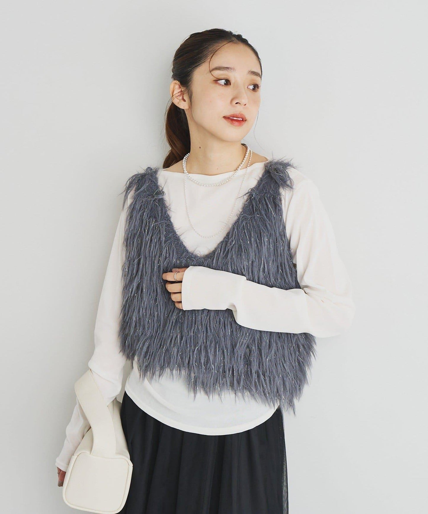 大人女性感羽毛針織背心