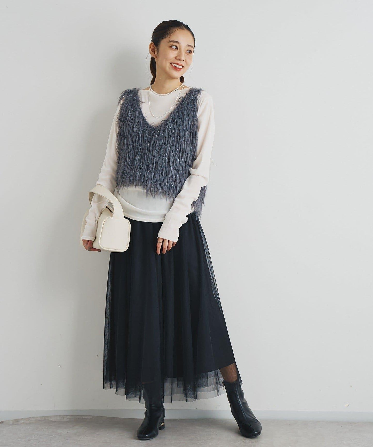 大人女性感羽毛針織背心