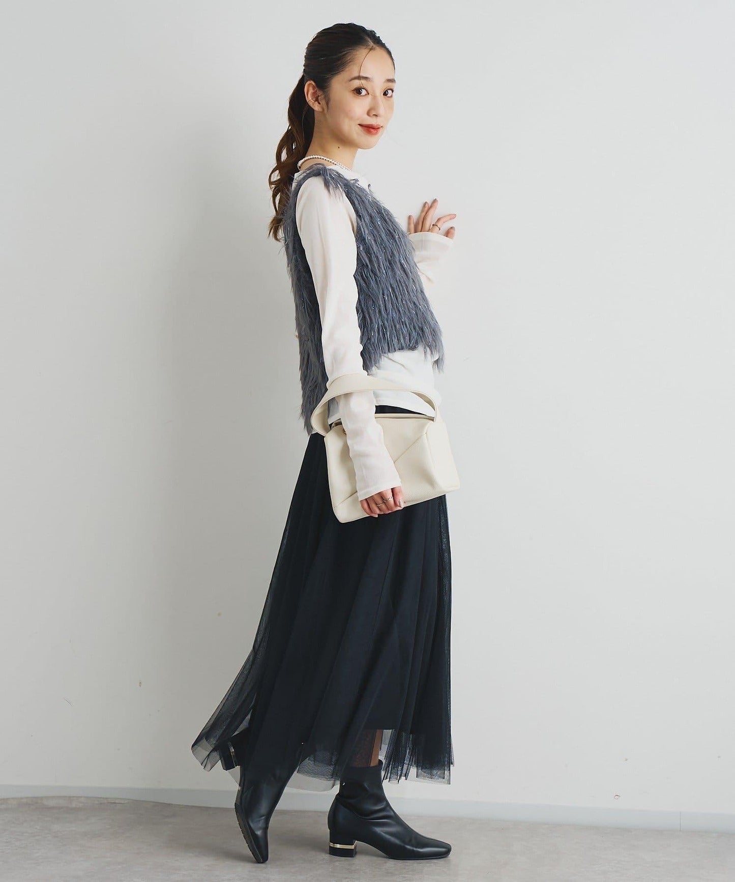 大人女性感羽毛針織背心