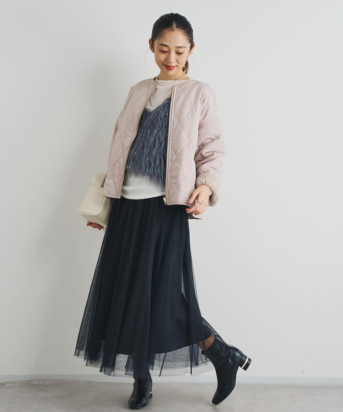 大人女性感羽毛針織背心