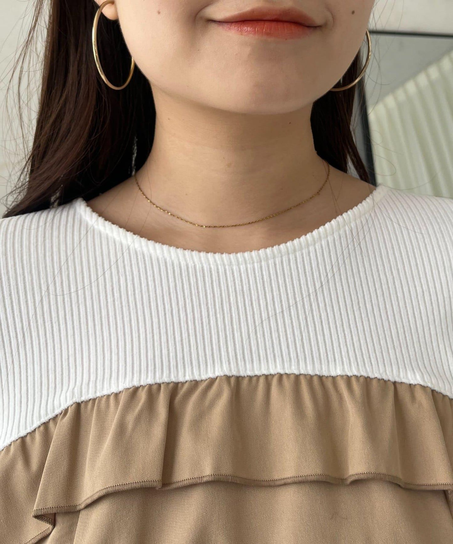 不規則下襬荷葉邊拼接A字羅紋長袖T恤