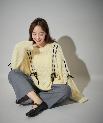 天鵝絨蝴蝶結編織羽毛針織衫