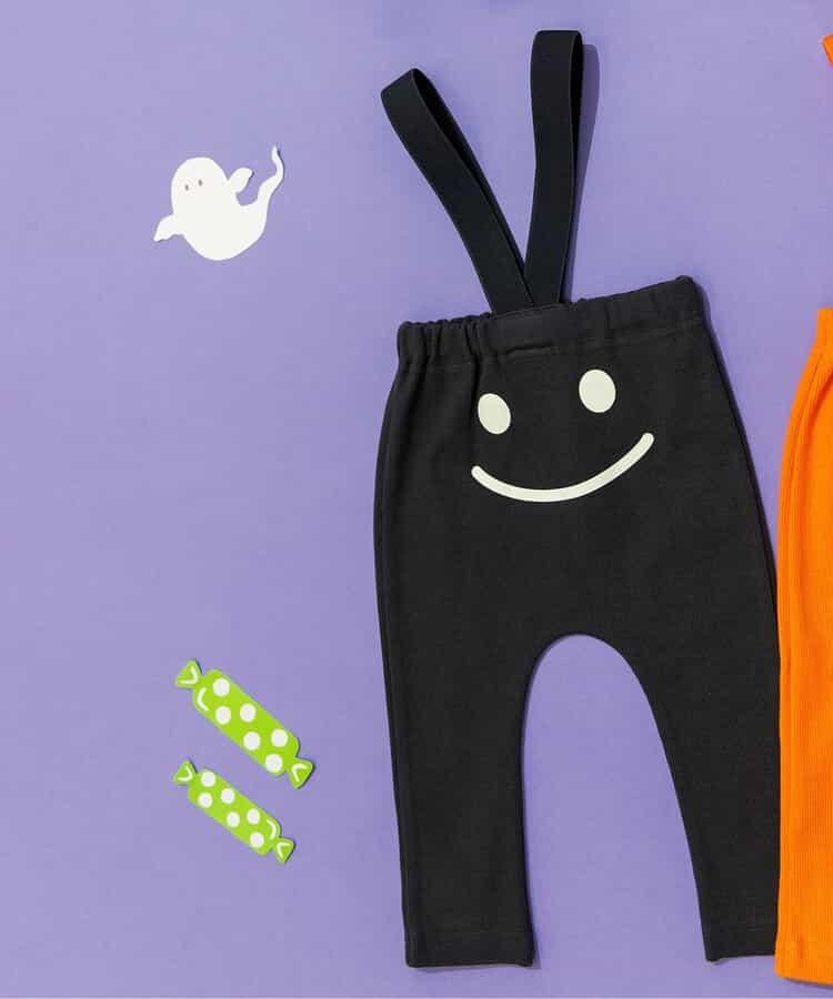 帶吊帶卡通臉圖案打底褲