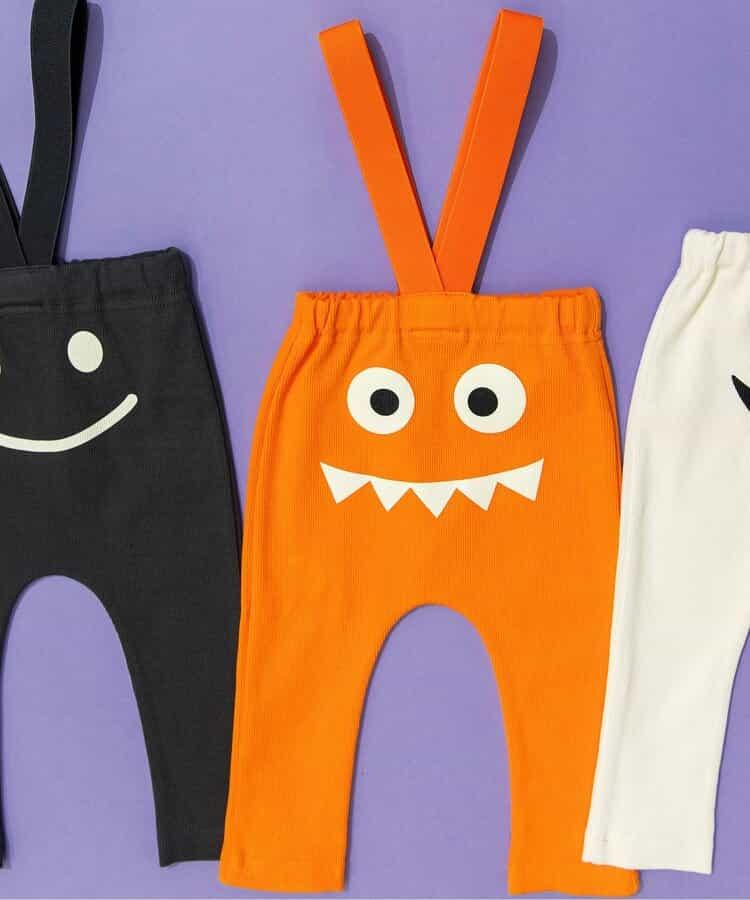 帶吊帶卡通臉圖案打底褲