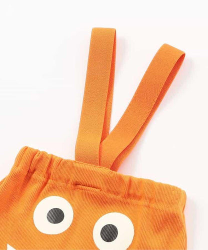 帶吊帶卡通臉圖案打底褲