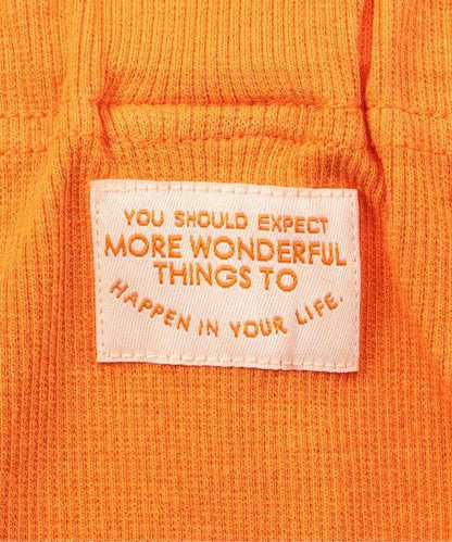 帶吊帶卡通臉圖案打底褲