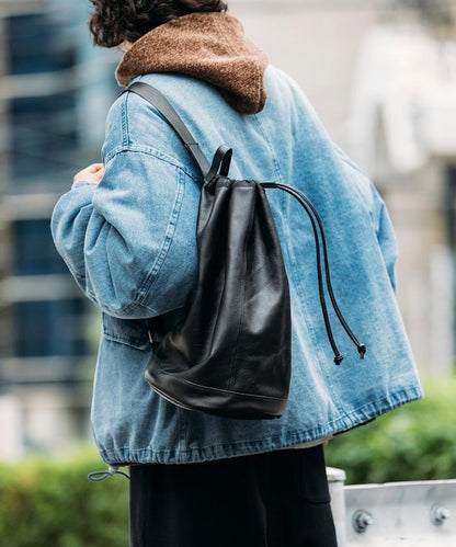 防潑水牛皮束口單肩包