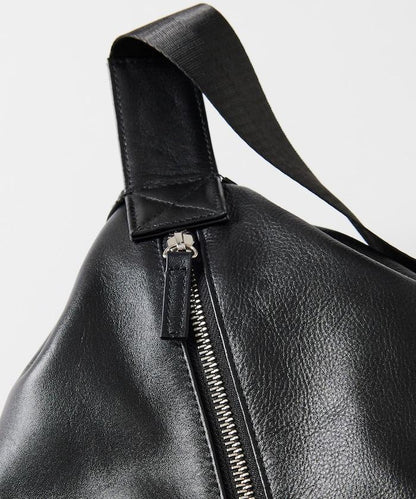 防潑水牛皮束口單肩包