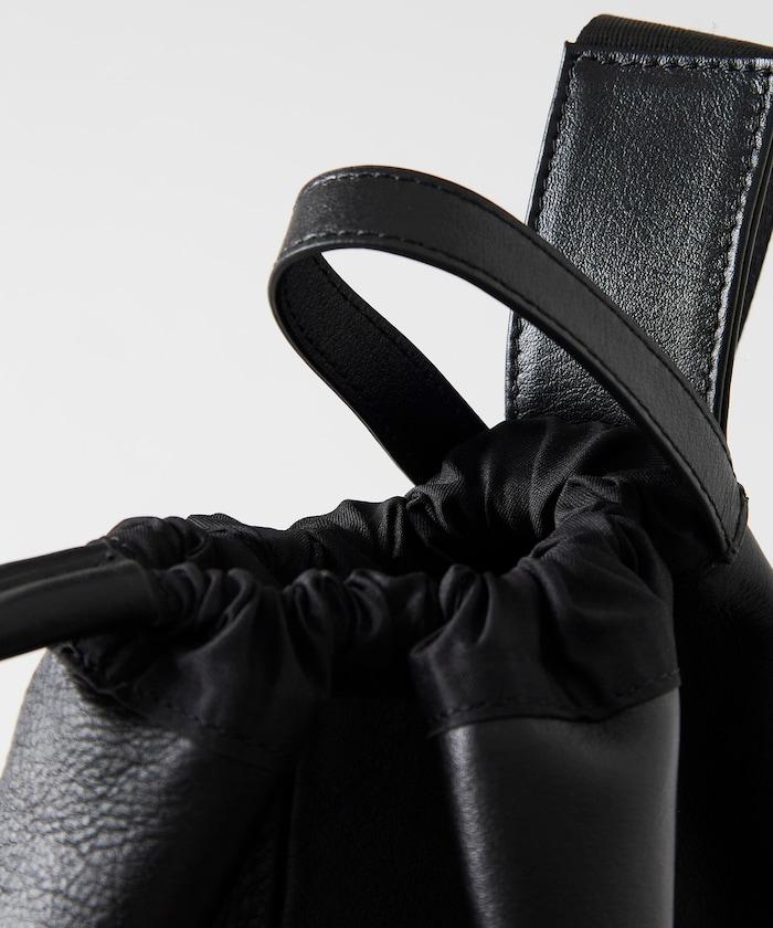 防潑水牛皮束口單肩包