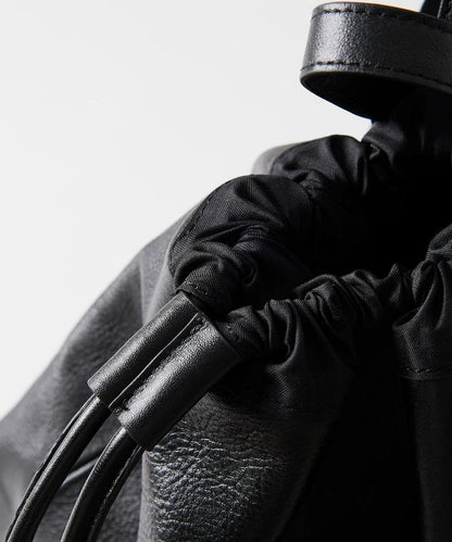 防潑水牛皮束口單肩包