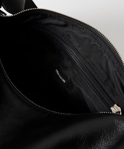 防潑水牛皮束口單肩包