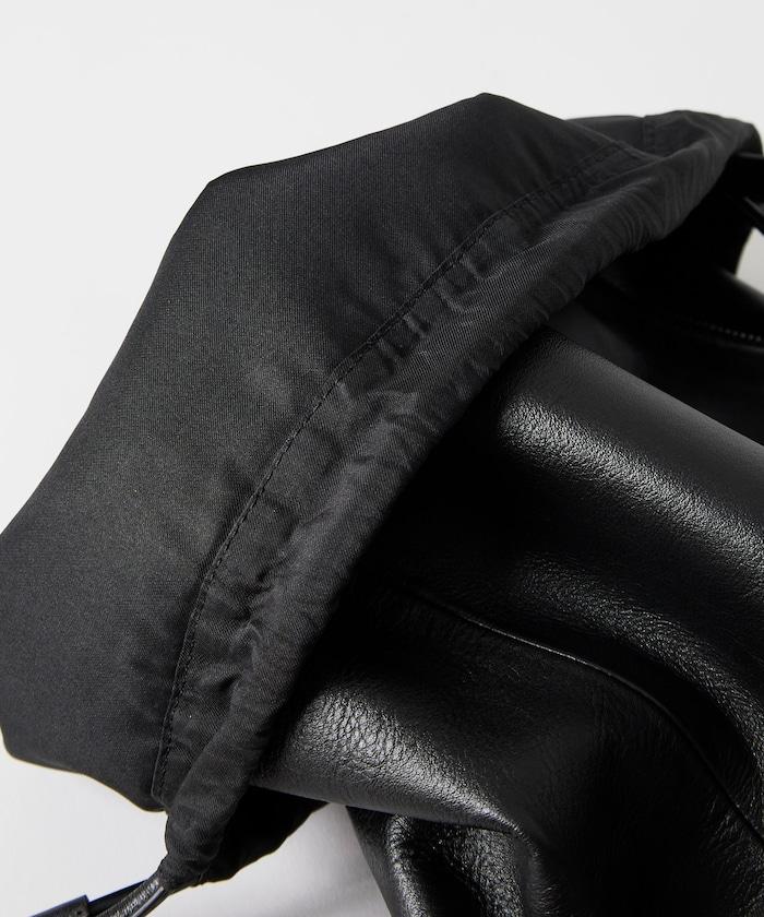 防潑水牛皮束口單肩包